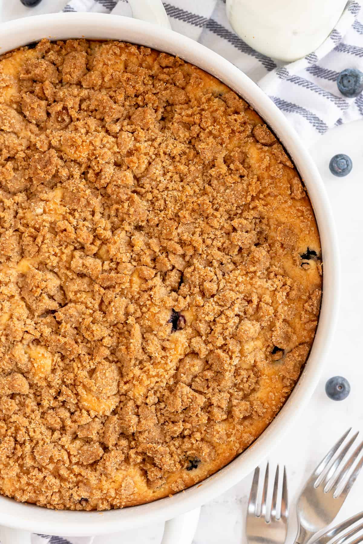 A close up of the top of a crumb cake.