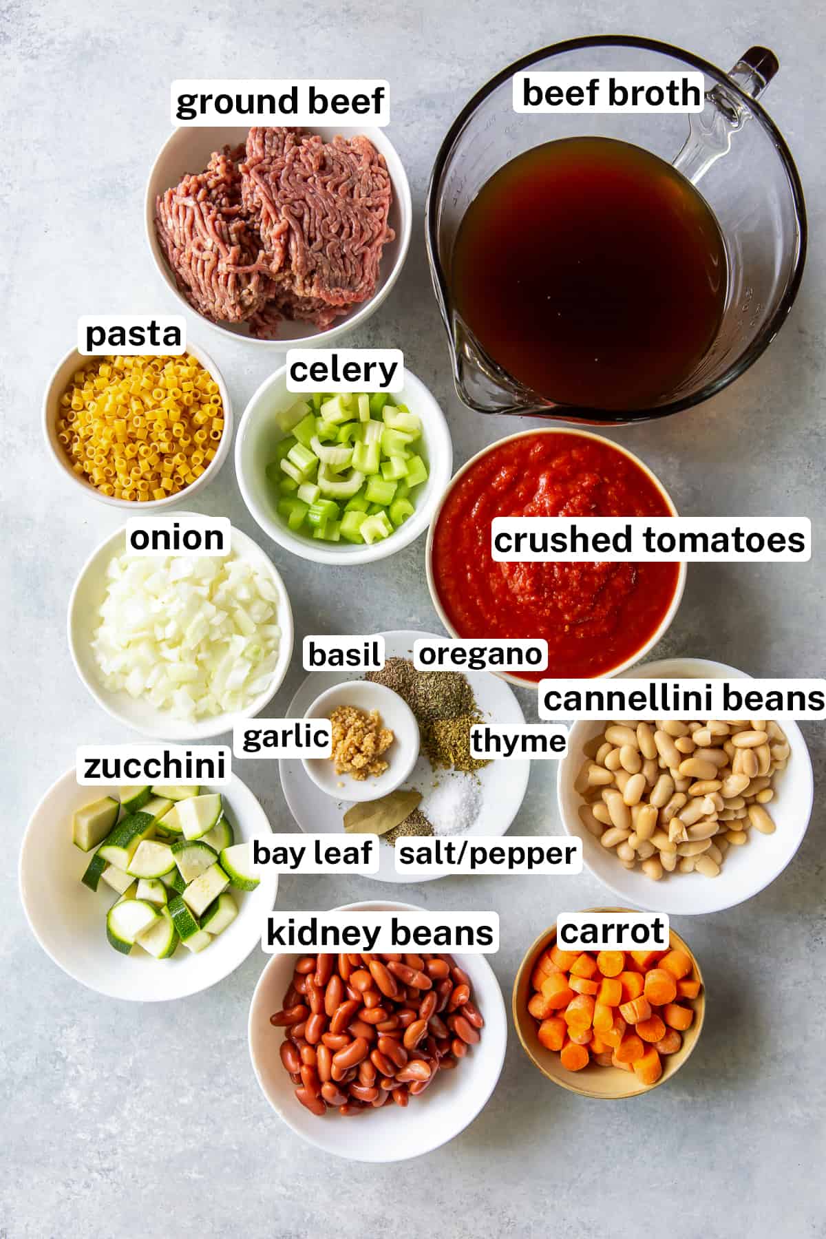 The ingredients to make Slow Cooker Hamburger Minestrone with overlay text.