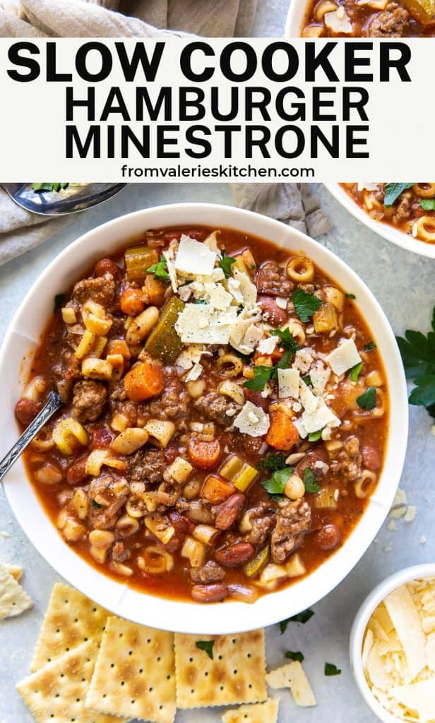 An over the top shot of a bowl of Slow Cooker Hamburger Minestrone with overlay text.