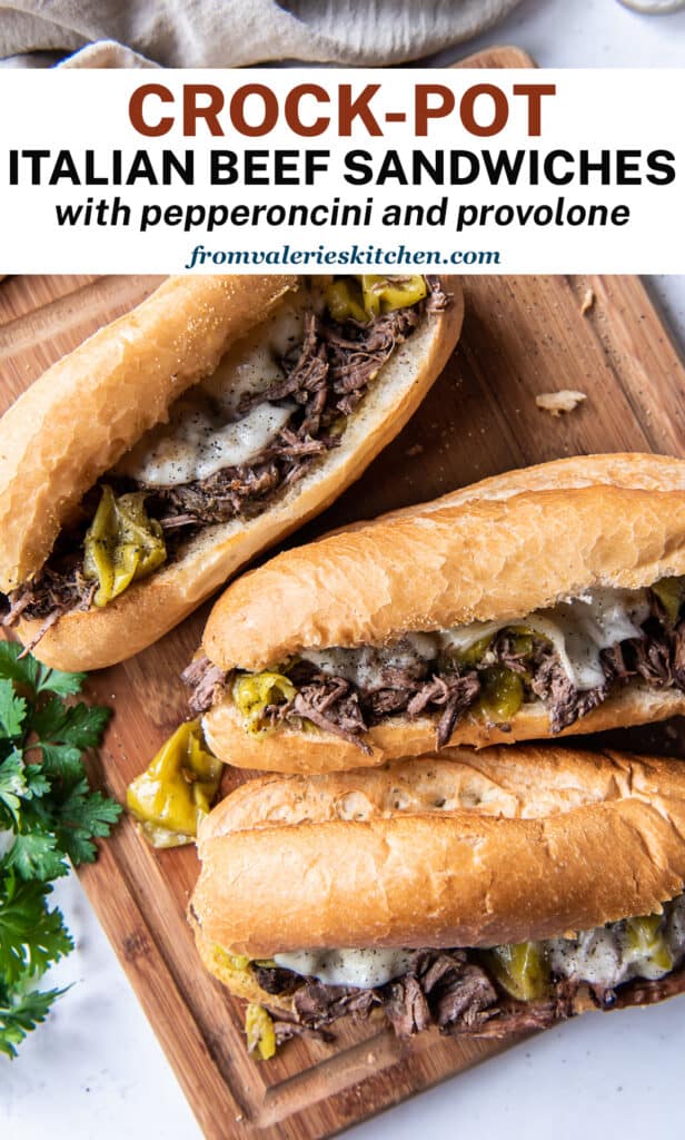 Italian Beef Sandwiches on a cutting board with overlay text.