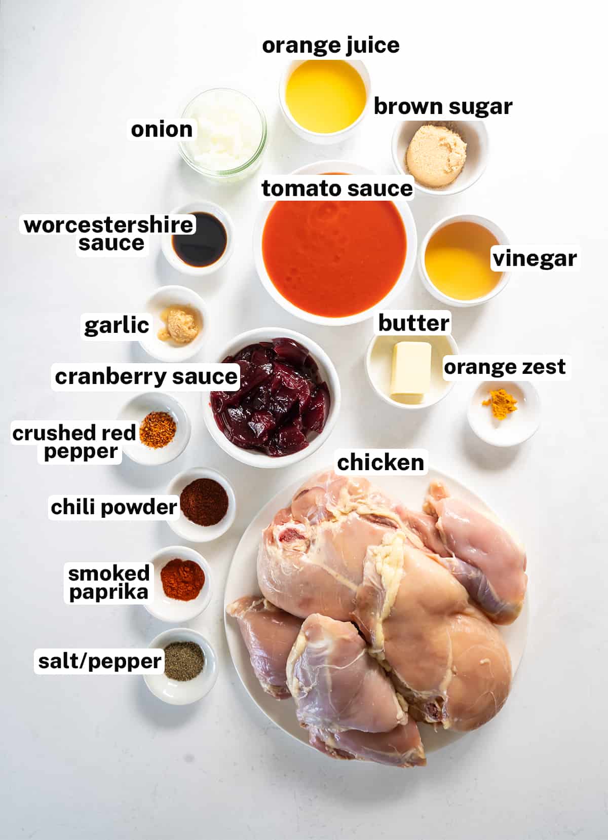 The ingredients to make Oven BBQ Chicken with overlay text.