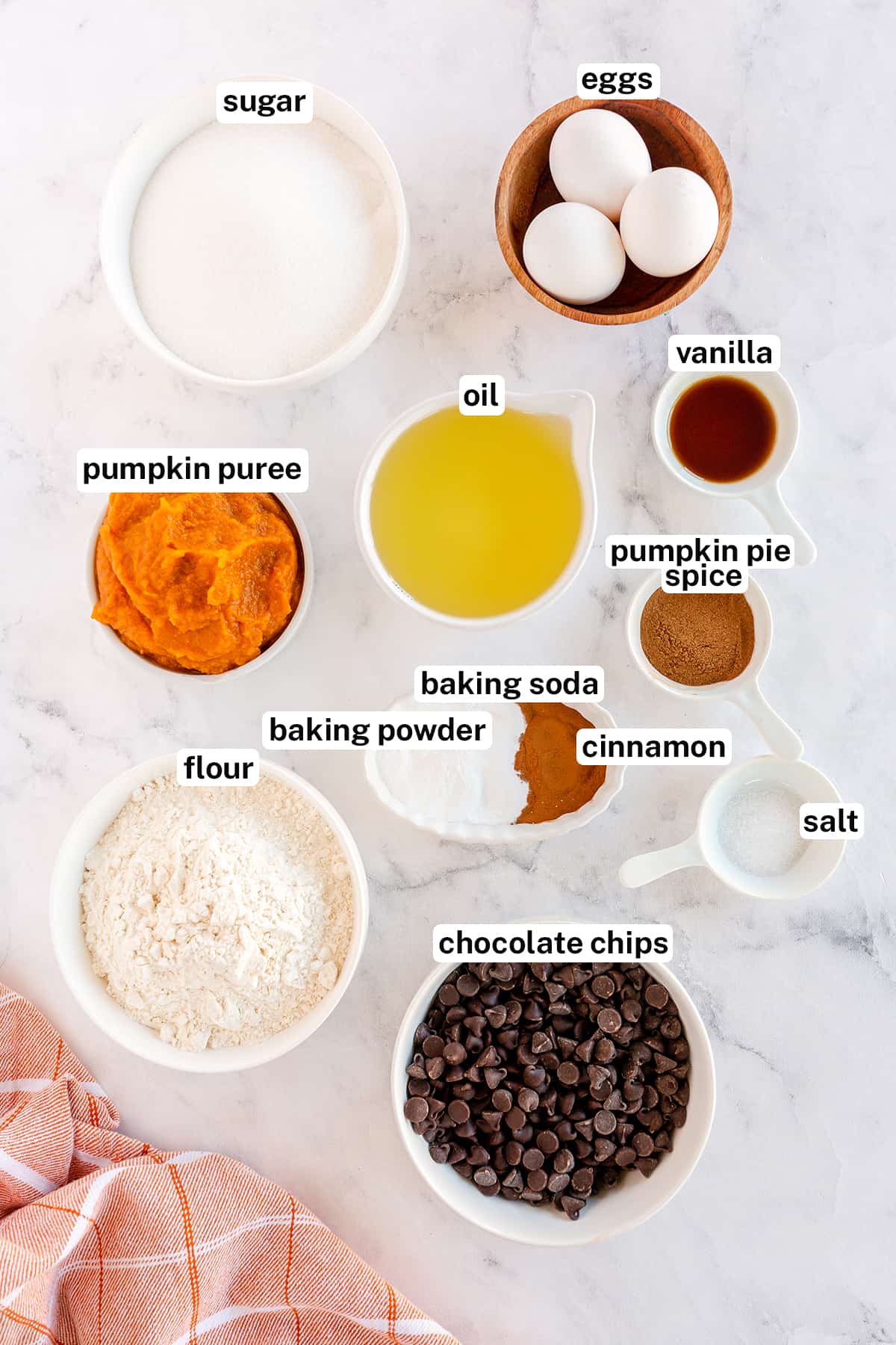 The ingredients for Pumpkin Chocolate Chip Cake with overlay text.