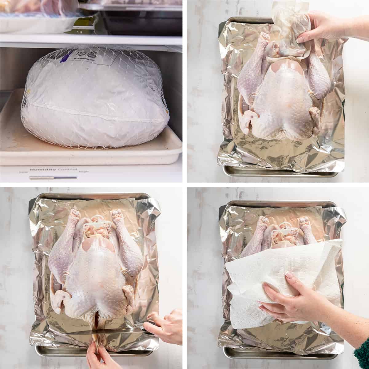 A turkey is trimmed and patted dry with a paper towel.
