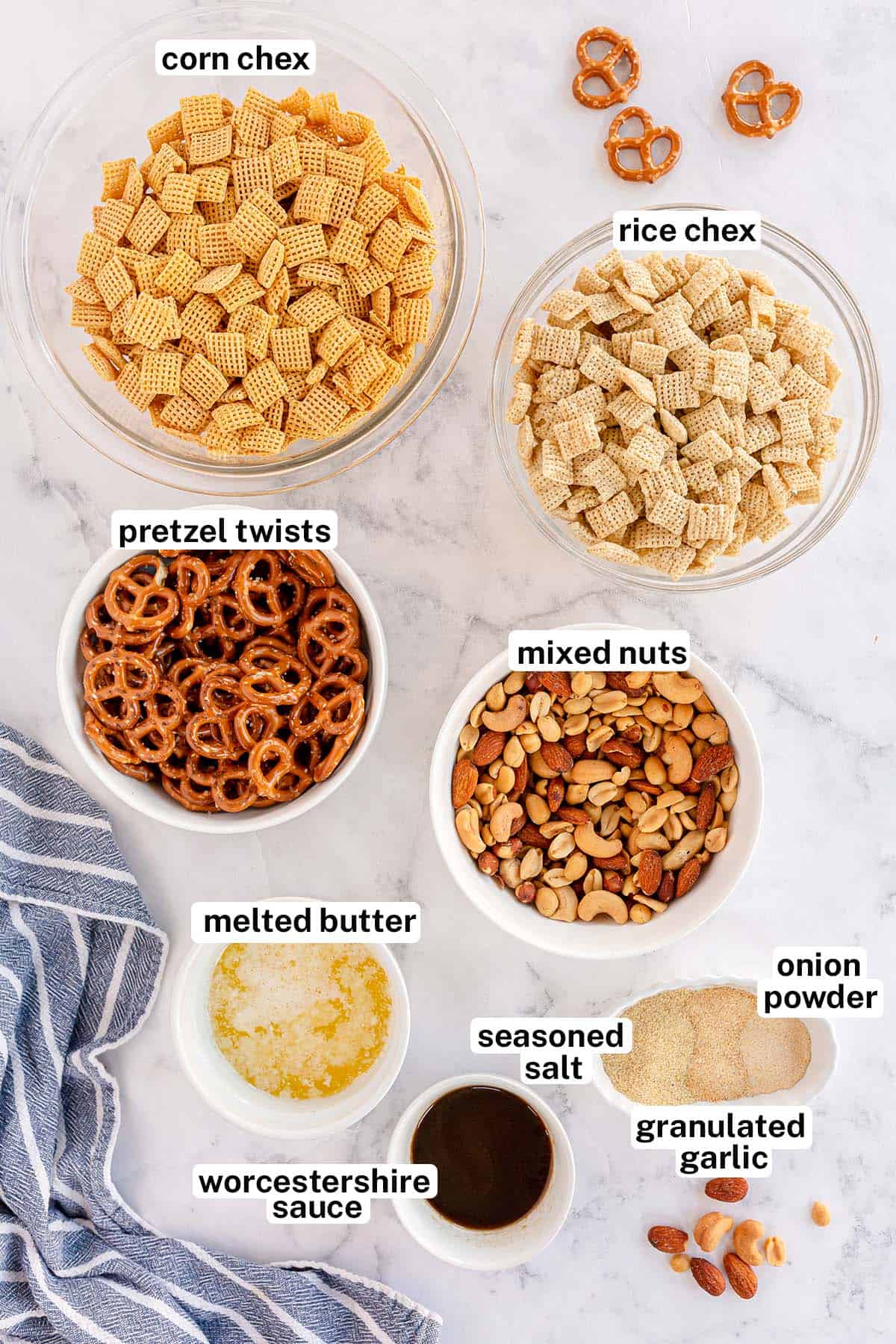 The ingredients for Chex Mix with overlay text.