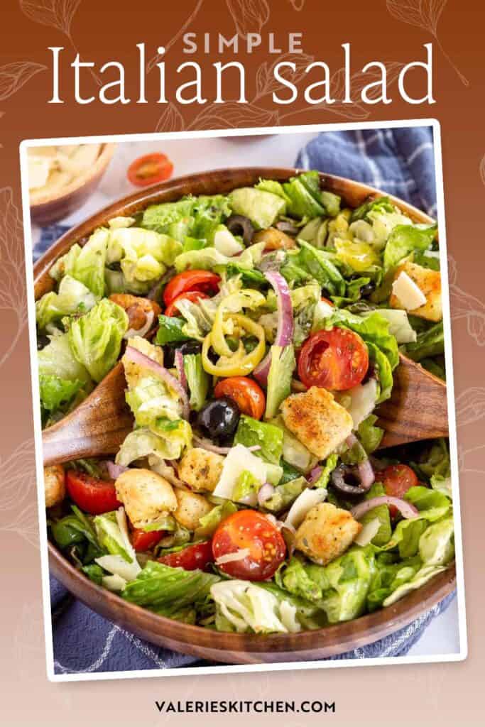 A bowl of Italian Salad with tomatoes, olives, and red onion with text overlay.