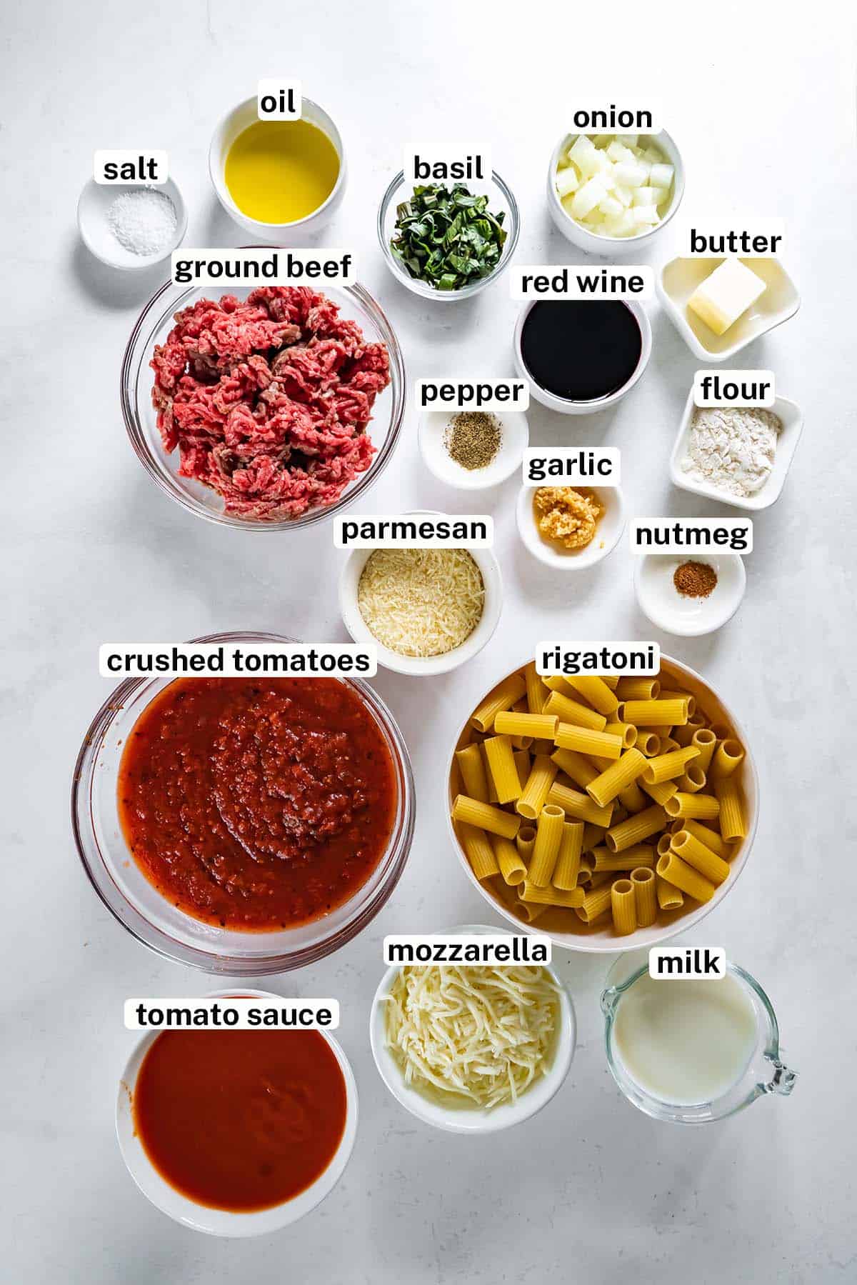 Ingredients for Baked Rigatoni with Meat Sauce with overlay text.