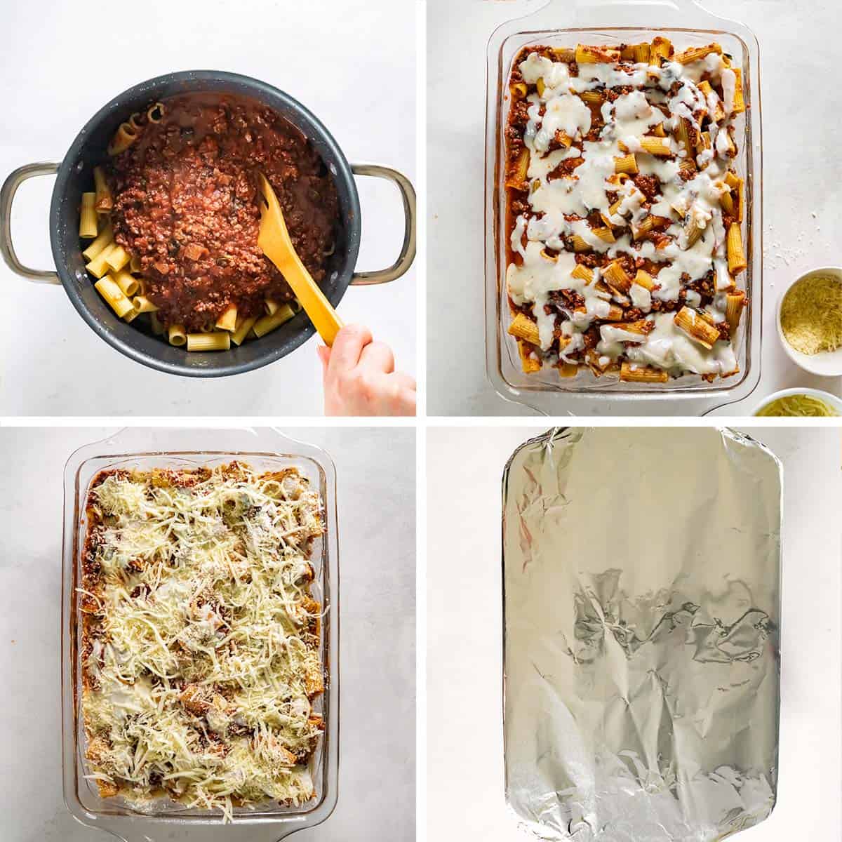 Rigatoni with meat sauce and bechamel is assembled in a baking dish.