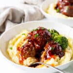 BBQ Meatballs and Mashed Potatoes in a bowl with broccoli.