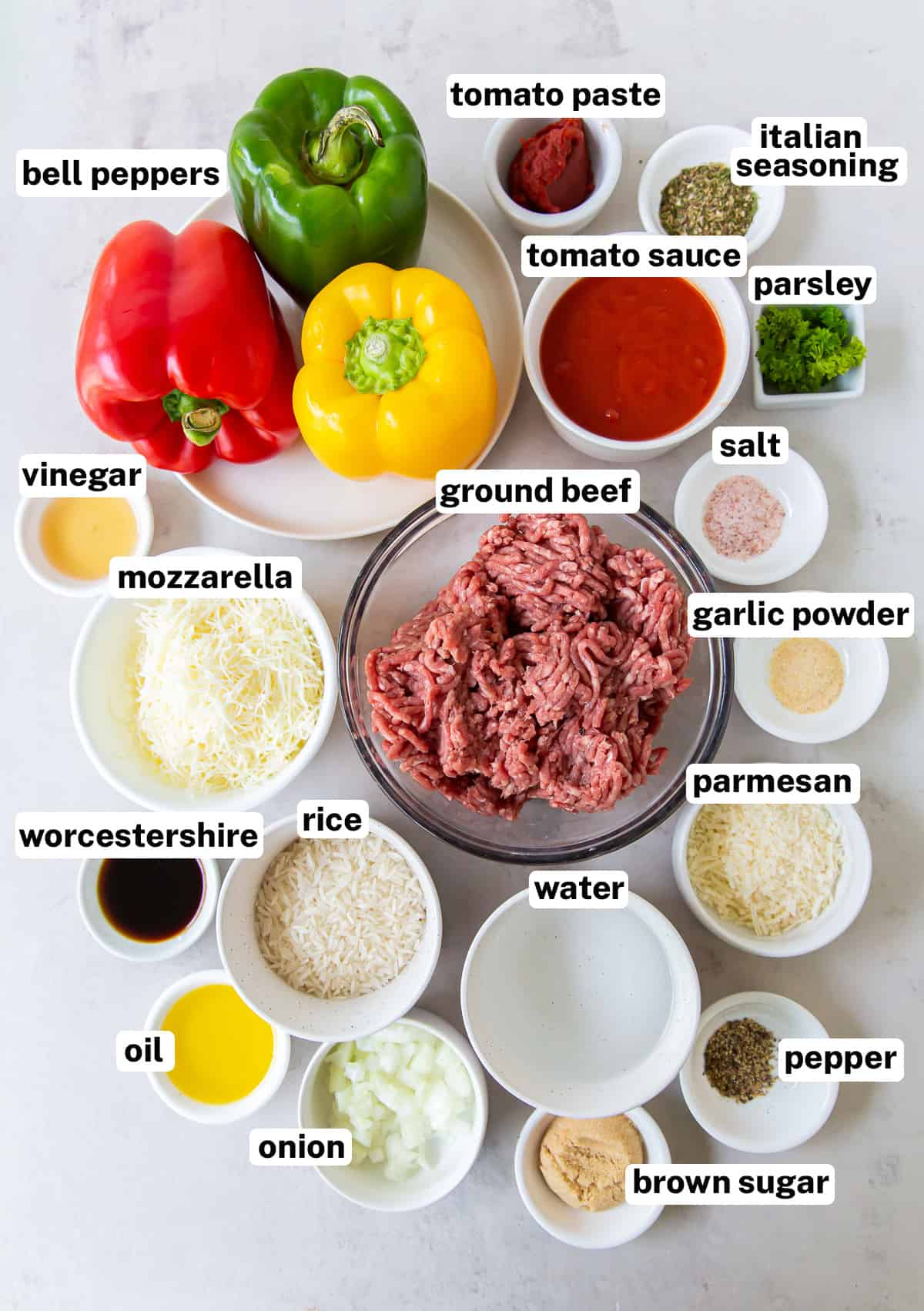 The ingredients to make Italian Stuffed Bell Peppers with text.