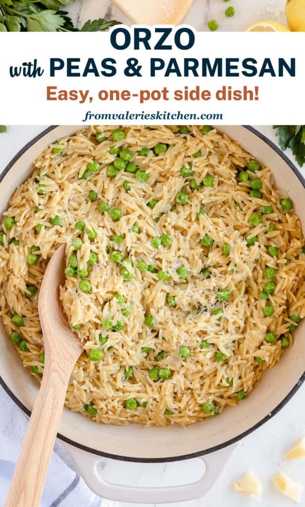 A top down shot of orzo with peas and parmesan in a skillet with text.