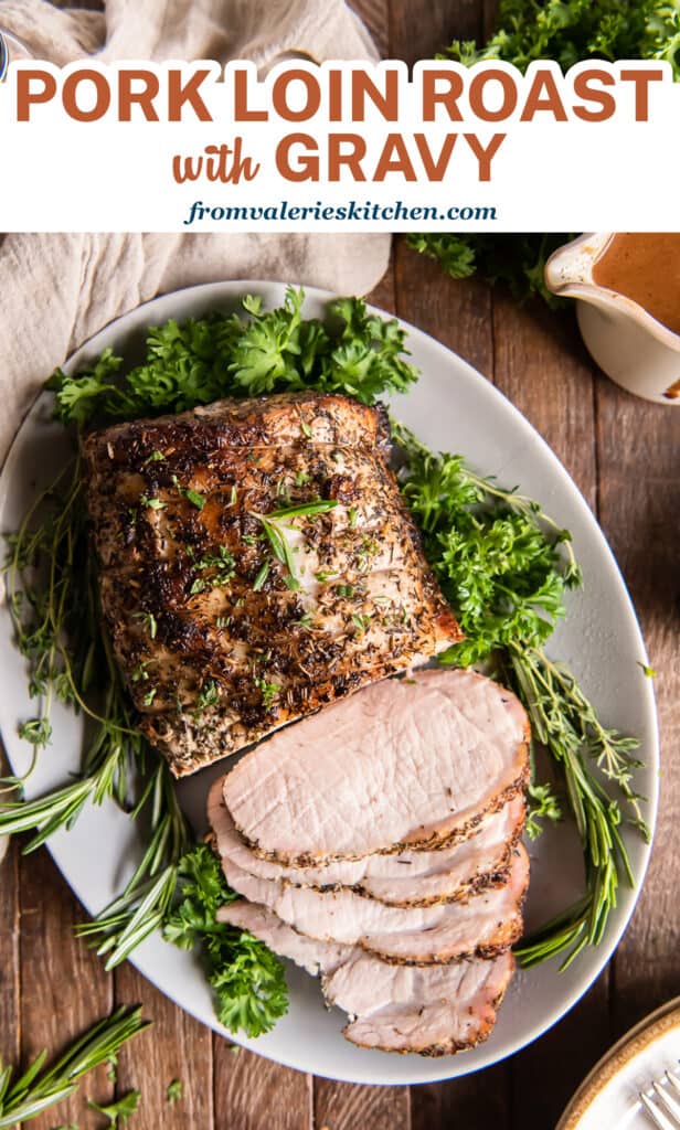 A top down shot of a pork loin on a platter with text.