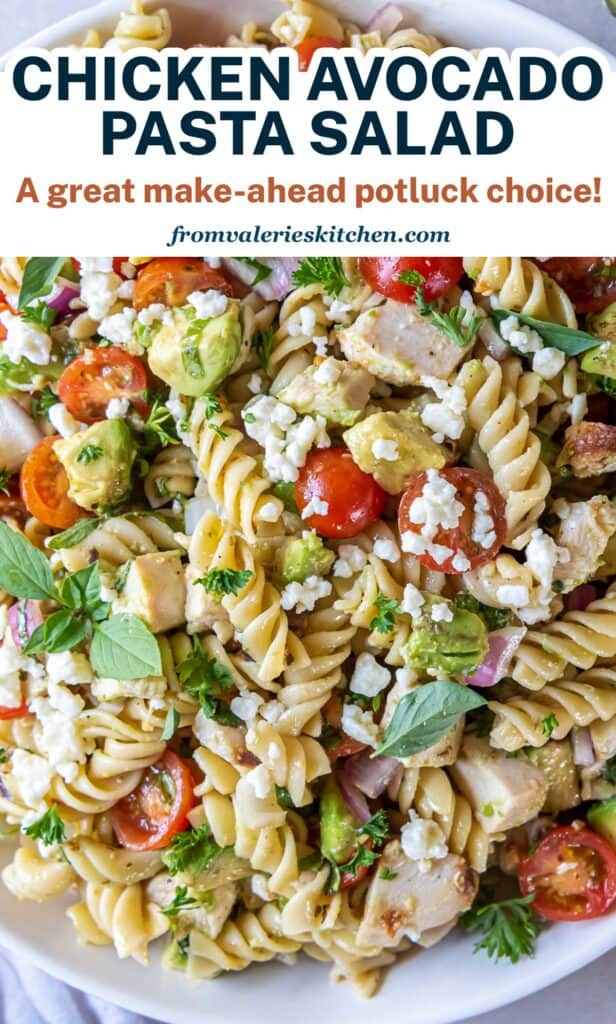 A close up of Chicken Avocado Pasta Salad in a bowl with text.