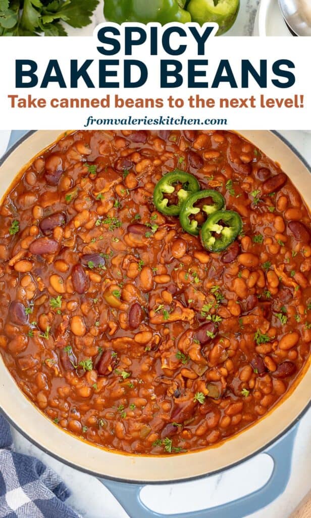 A top down shot of baked beans in a Dutch oven with text.