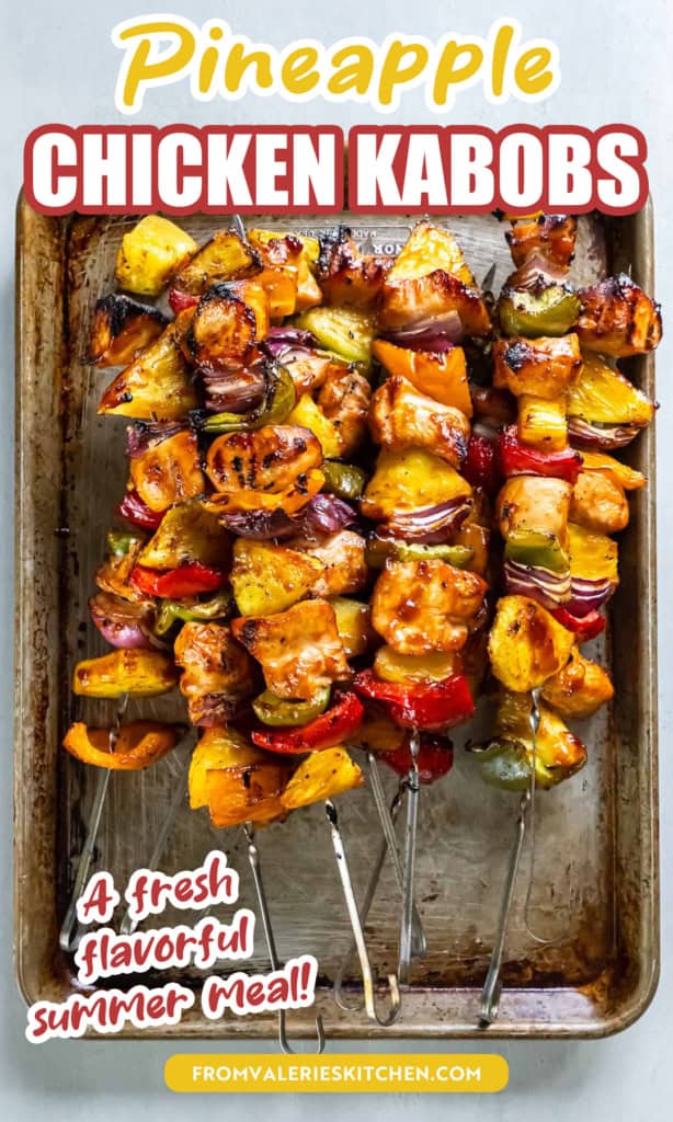 Pineapple chicken kabobs on a baking sheet with text overlay.