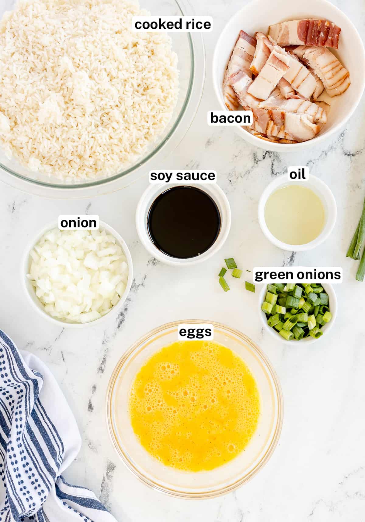 The ingredients for Bacon and Egg Fried Rice with text.