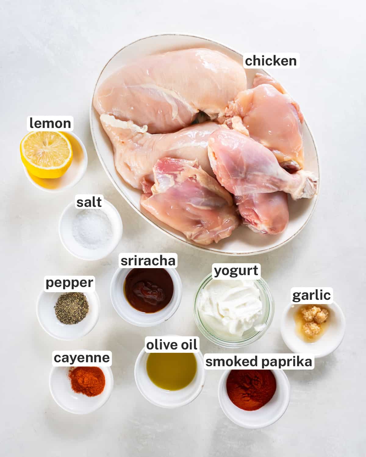 The ingredients for grilled paprika chicken with text.
