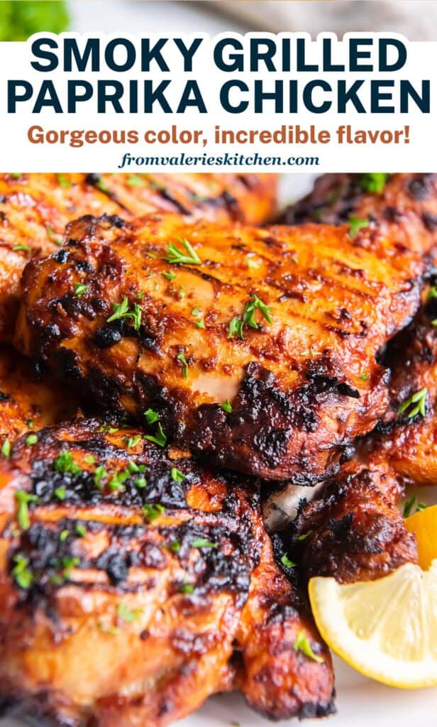 Grilled paprika chicken on a plate with text.