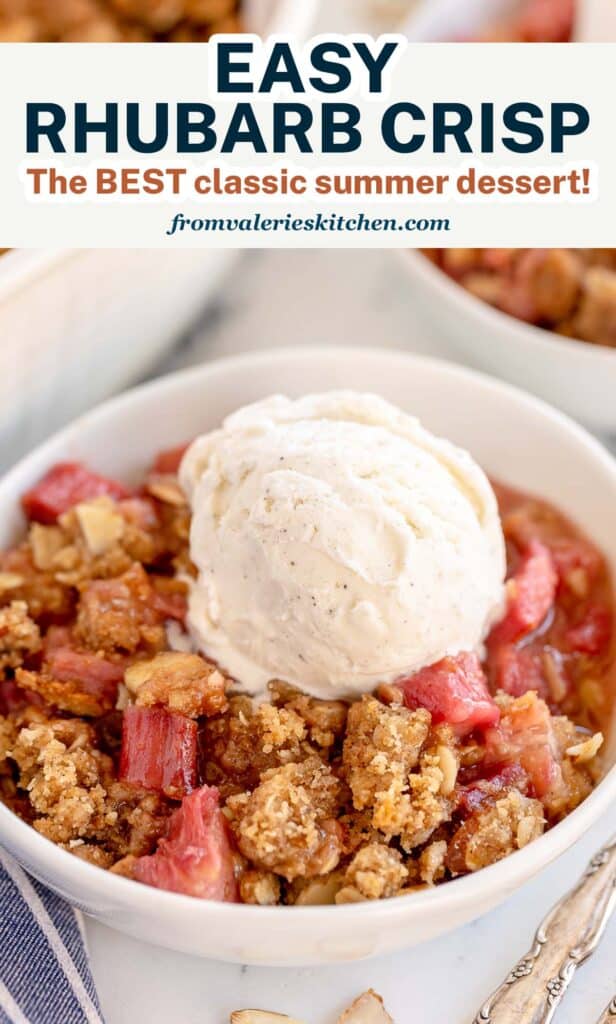 A white bowl filled with rhubarb crisp topped with a scoop of vanilla ice cream with text.