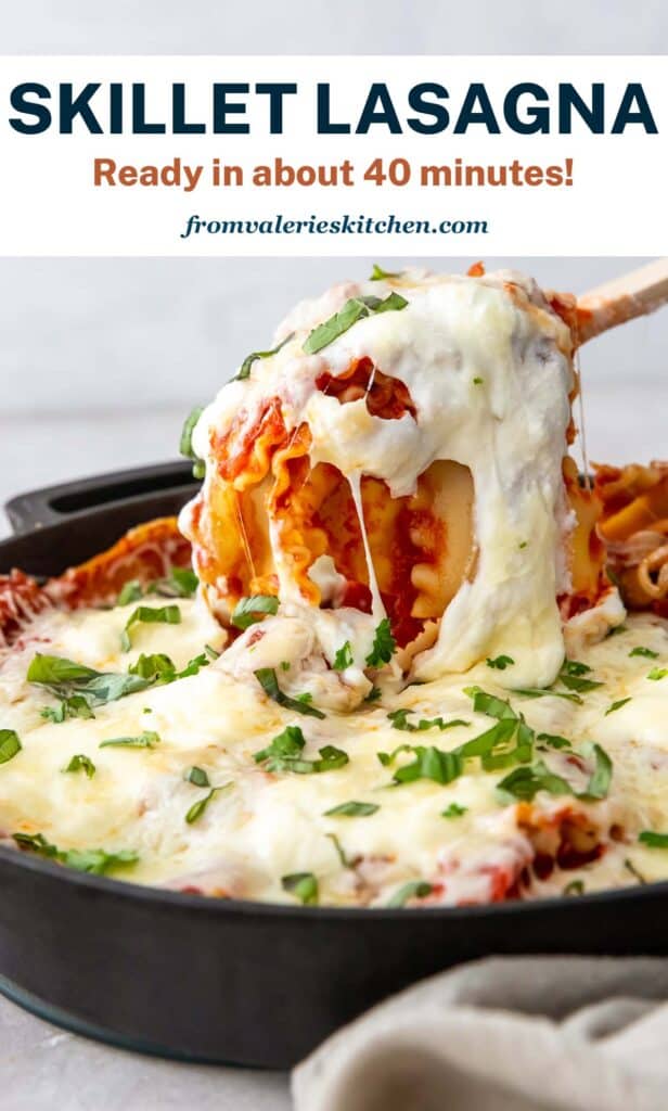 A wooden spoon scoops lasagna from a skillet with text.