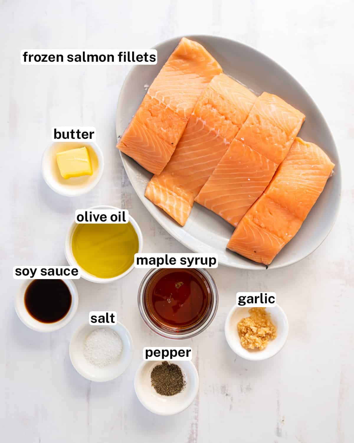 Frozen salmon with other ingredients with text.
