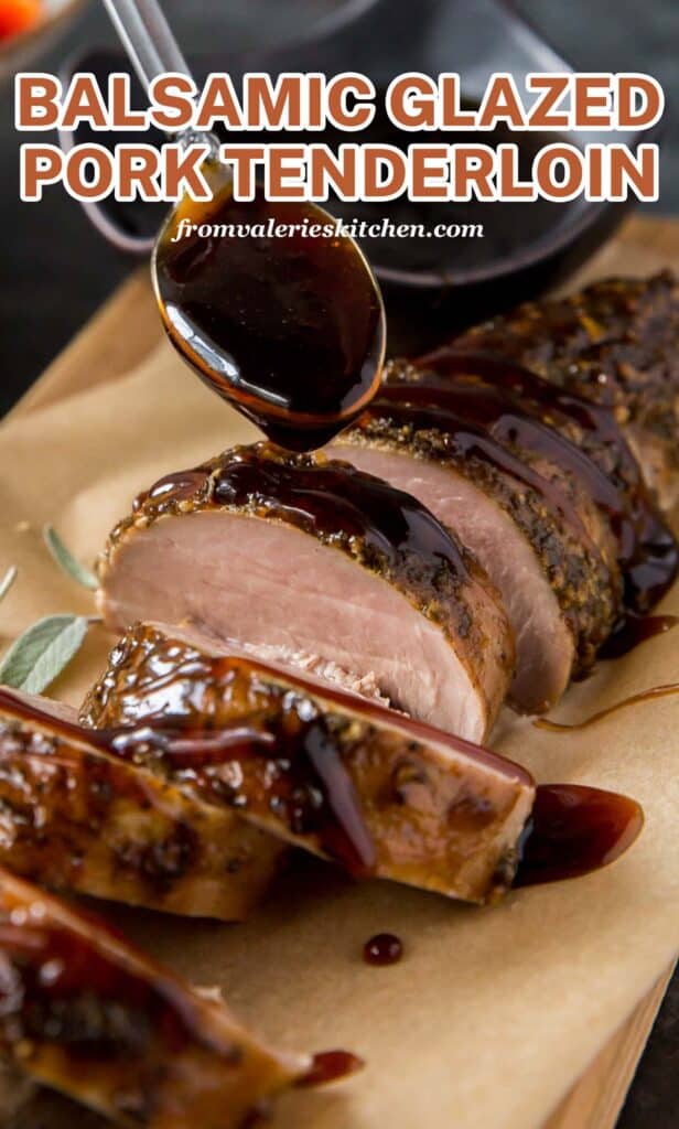 Balsamic glaze drizzling off a spoon on to sliced pork tenderloin.