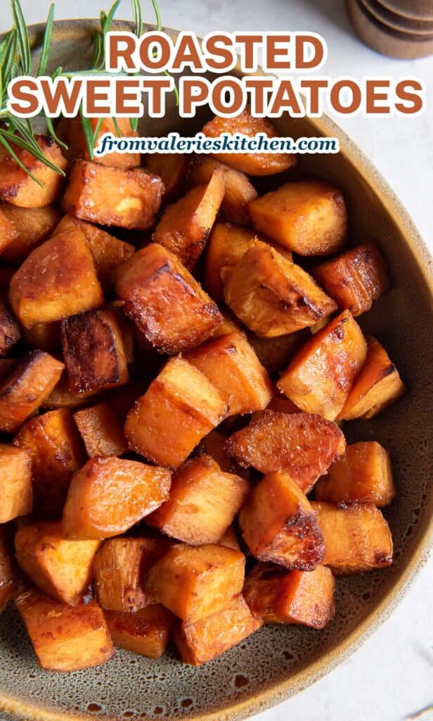 Roasted sweet potatoes in a wood bowl with text overlay.