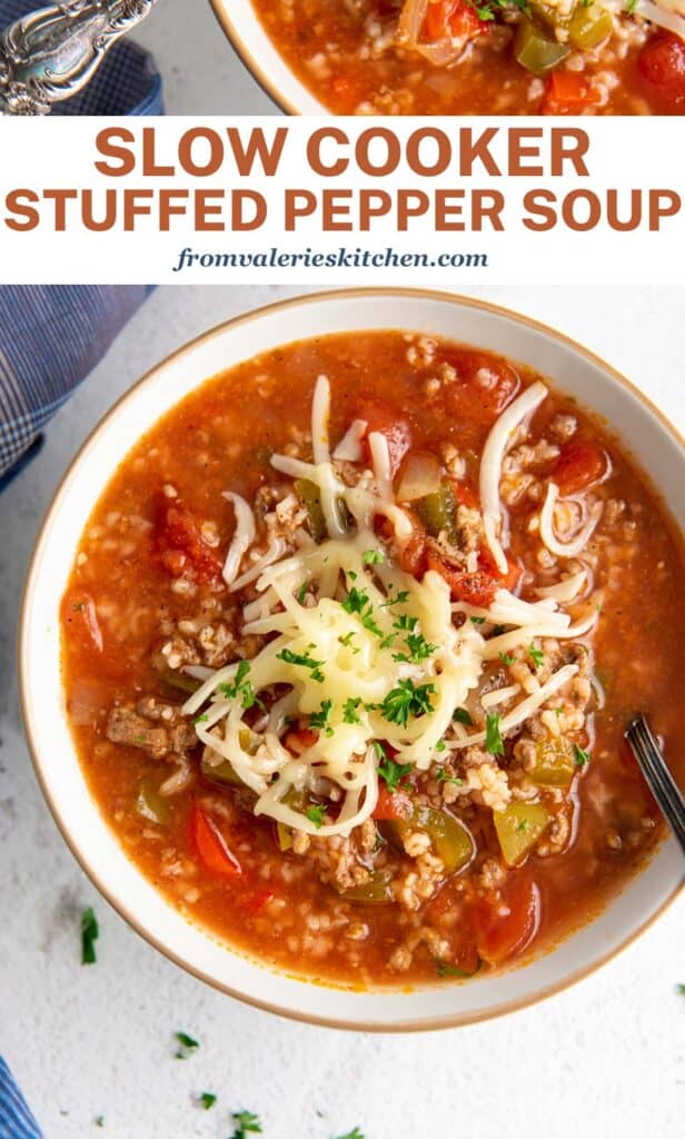 A top down shot of spoon resting in a bowl of soup with ground beef, rice, peppers, and topped with shredded cheese with text.