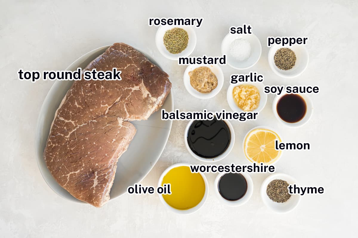 A top round steak, seasonings, and oil in small bowls with text.