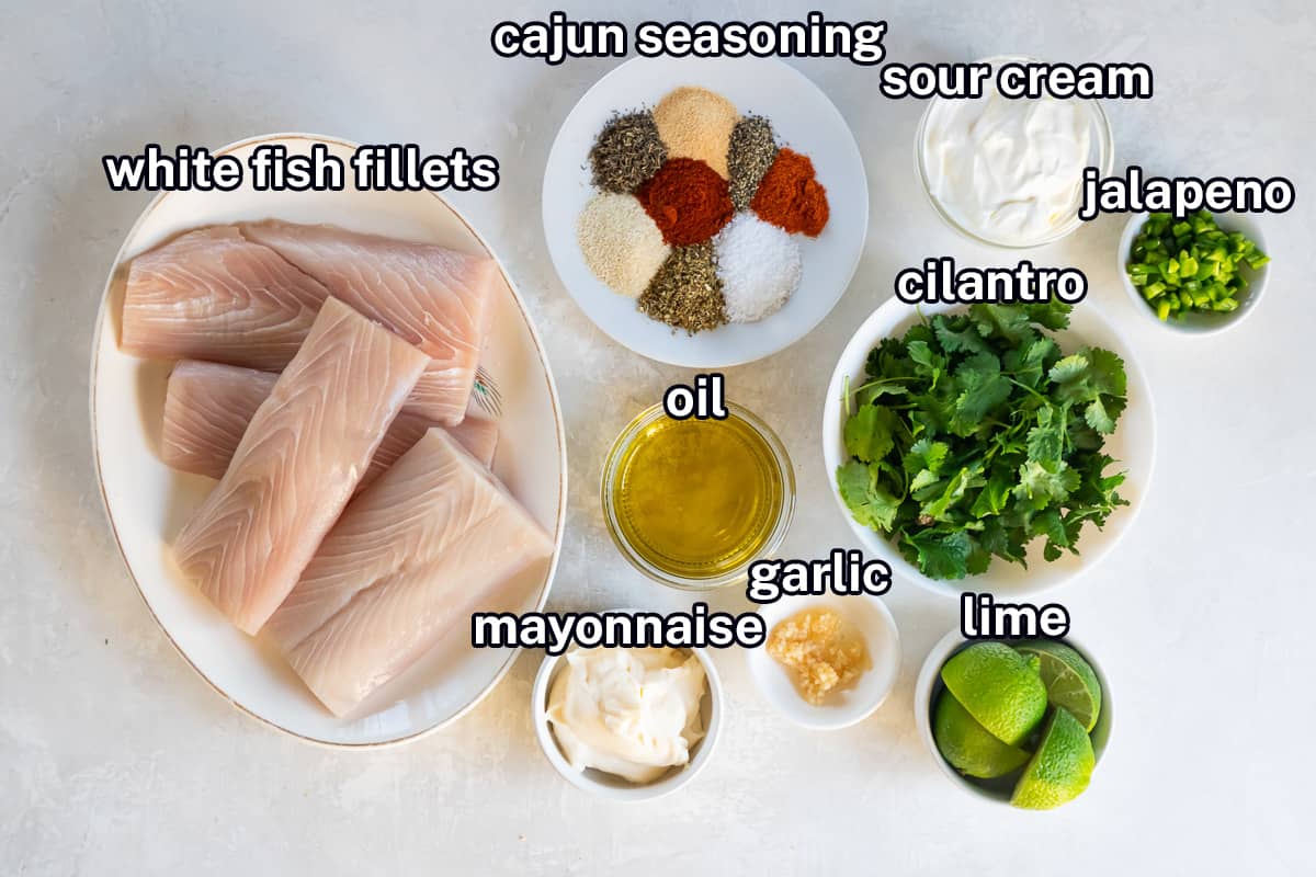Mahi mahi fillets, assorted seasonings, and other ingredients in bowls with text.