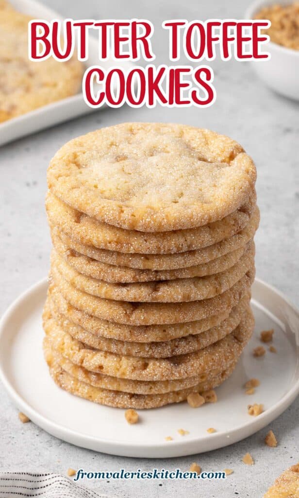 A tall stack of toffee cookies on a small white plate with text.