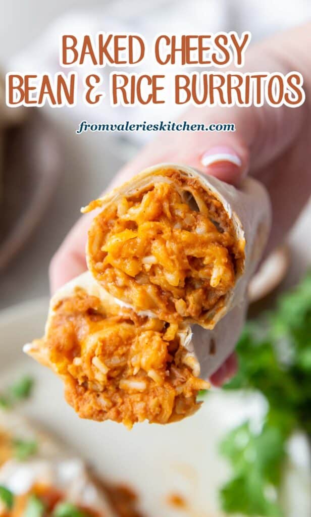 A hand holding two halves of a burrito with rice, cheese, and beans with text overlay.