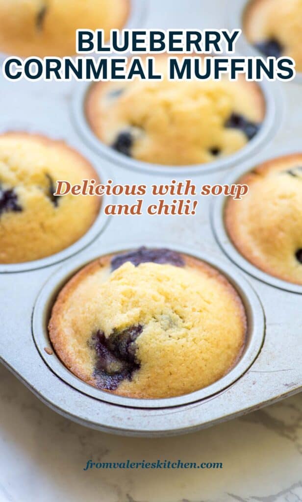 Blueberry cornmeal muffins in a muffin tin with text.