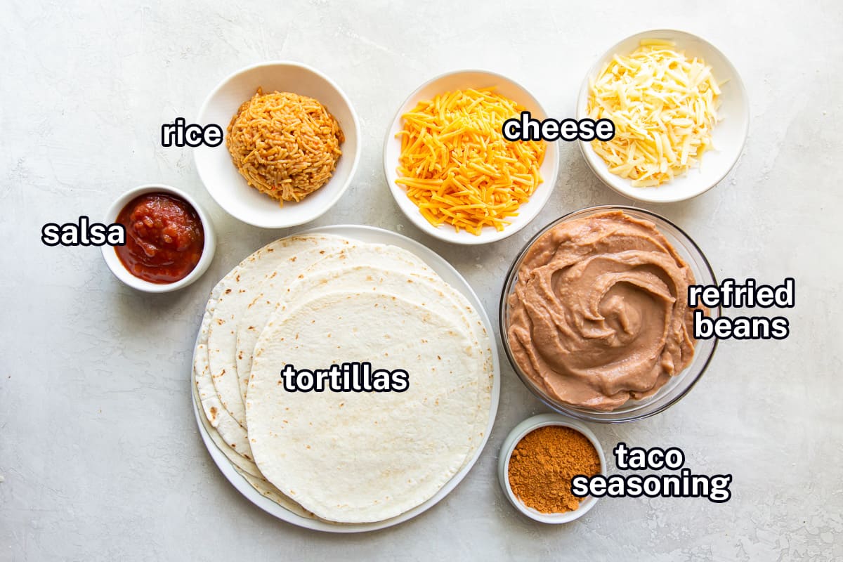 Tortillas, rice, beans, cheese, salsa, and taco seasoning in bowls with text.