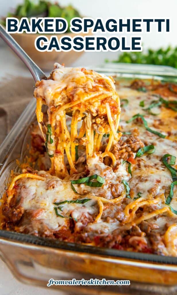 A spoon scooping spaghetti from a baking dish with text.