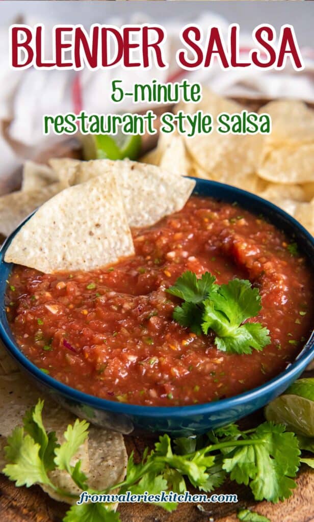 Two tortilla chips resting in a bowl of salsa on a platter with cilantro and more chips with text.
