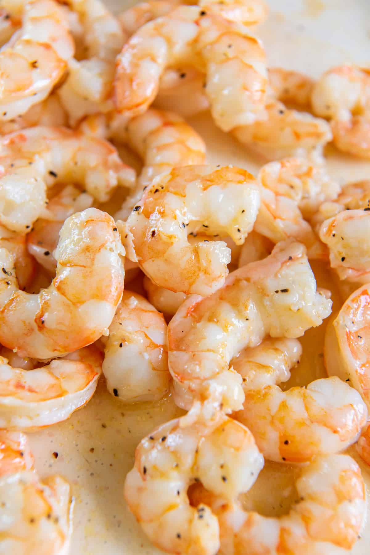 Roasted shrimp on a baking sheet.