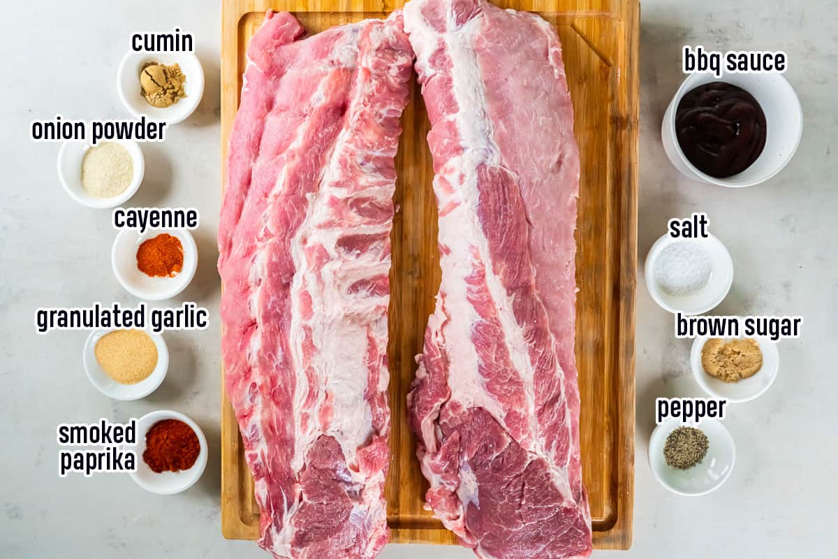Two racks of baby back ribs and other ingredients in small bowls with text.