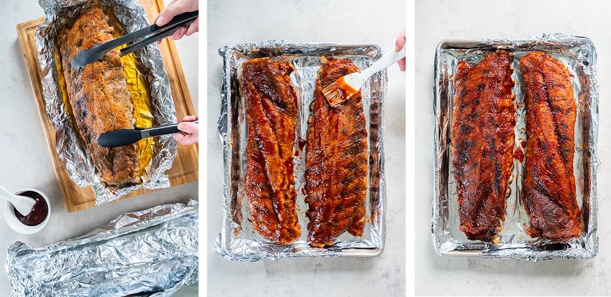 Cooked ribs being lifted with tongs, brushed with BBQ sauce, and on a foil lined baking sheet.