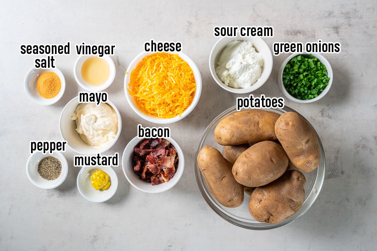 Potatoes, cheese, bacon, and other ingredients in bowls with text.
