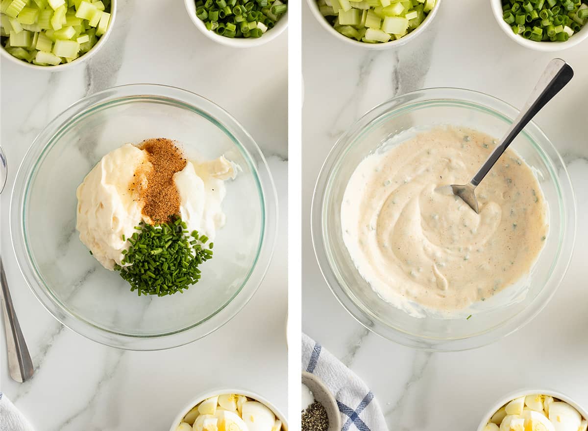 Mayonnaise sour cream, chives and other seven layer salad dressing ingredients in a bowl with a spoon.