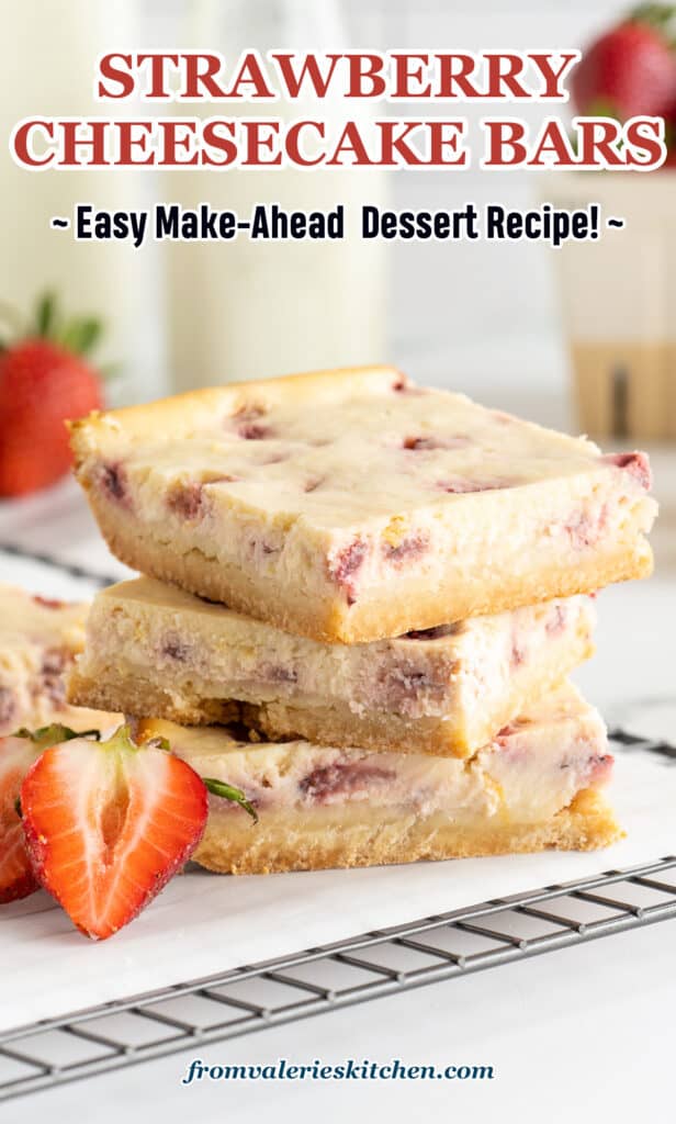 Three Strawberry Cheesecake Bars stacked on a wire rack with sliced strawberries next to them with text.