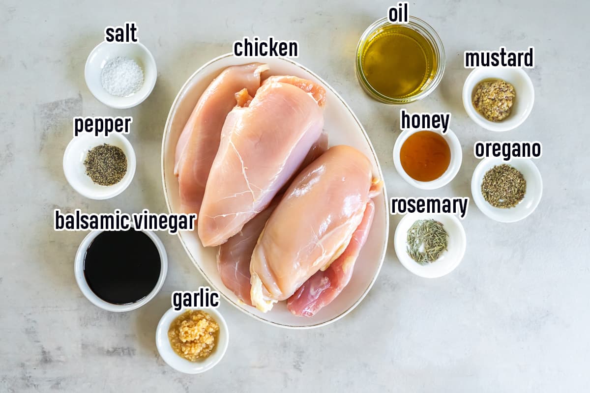 Chicken on a plate next to balsamic marinade ingredients in bowls with text.