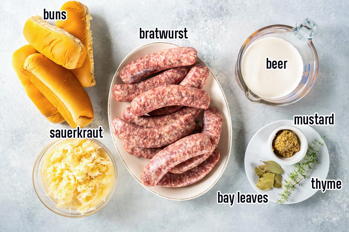 Bratwurst, beef, sauerkraut and other ingredients in bowls with text.
