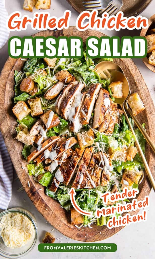 Chicken caesar salad in a wood bowl with text overlay.