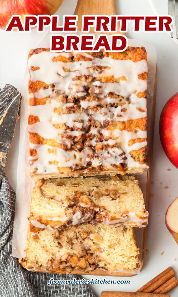 A top down shot of sliced apple fritter bread on a board with text.