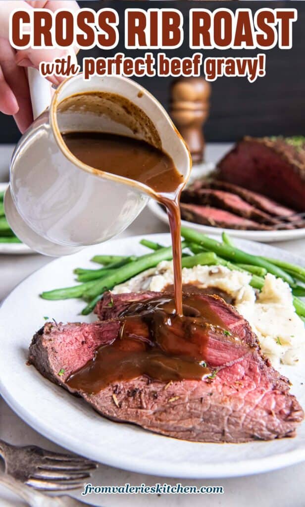 A hand pouring gravy from a gravy boat over slices of cross rib roast on a dinner plate with text.