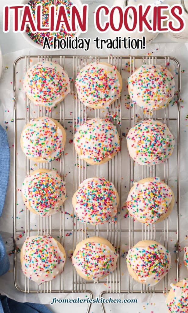 A top down shot of Italian Cookies with icing and rainbow sprinkles on a wire rack with text.