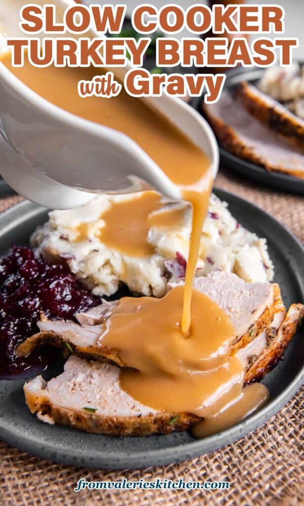 Slow cooker turkey gravy pouring from a gravy boat over slices of turkey on a plate with text.