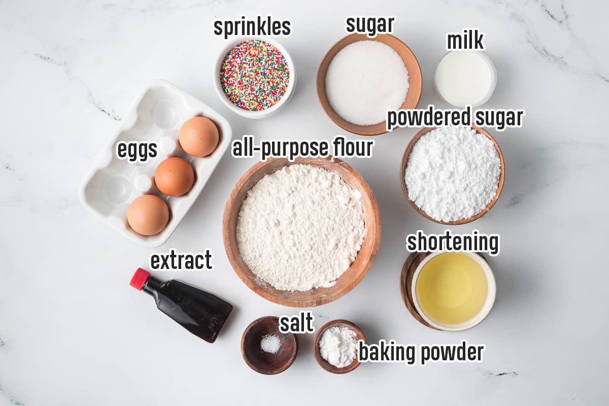 Flour, sugar, sprinkles, and other ingredients for Italian Cookies with text.