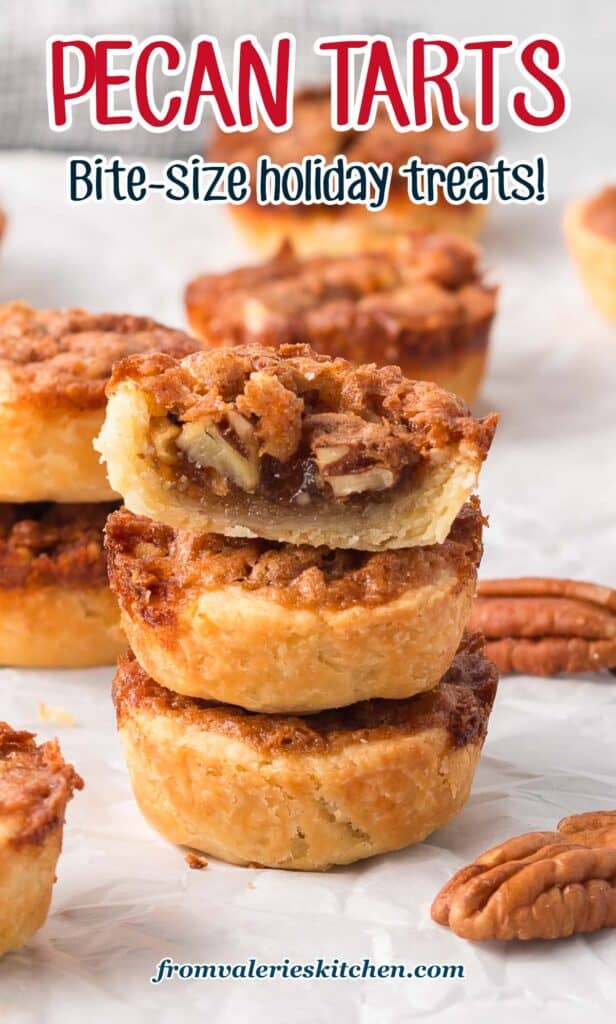A stack of three pecan tarts with a bite missing from the one on top with text.